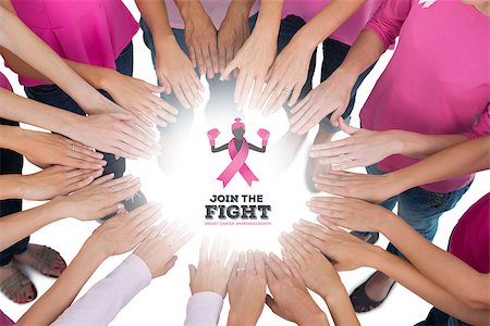 simsearch:400-07834847,k - Hands joined in circle wearing pink for breast cancer against breast cancer awareness message Stock Photo - Budget Royalty-Free & Subscription, Code: 400-07835044