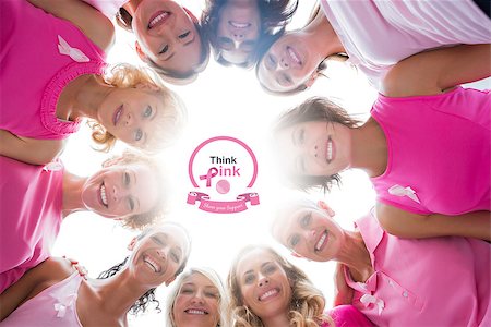 simsearch:400-07834847,k - Cheerful women in circle wearing pink for breast cancer against breast cancer awareness message Stock Photo - Budget Royalty-Free & Subscription, Code: 400-07835045