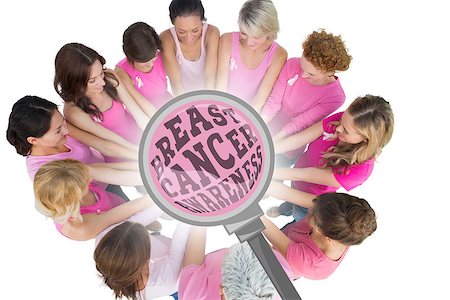 simsearch:400-07835111,k - Cheerful women joined in a circle wearing pink for breast cancer against breast cancer awareness message Stock Photo - Budget Royalty-Free & Subscription, Code: 400-07835047