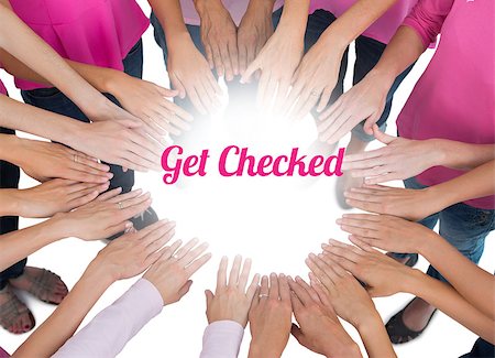 simsearch:400-07834847,k - Hands joined in circle wearing pink for breast cancer on white background Stock Photo - Budget Royalty-Free & Subscription, Code: 400-07835078
