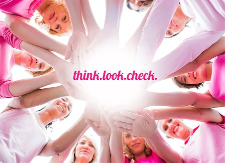 simsearch:400-07834847,k - Diverse women smiling in circle wearing pink for breast cancer on white background Stock Photo - Budget Royalty-Free & Subscription, Code: 400-07835073