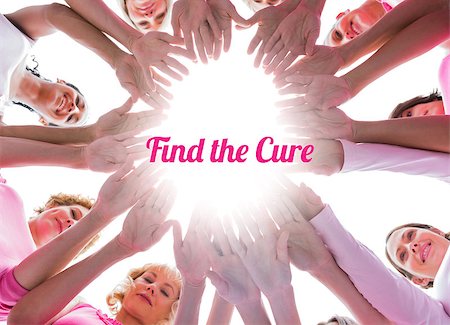 simsearch:400-07834847,k - Happy women in circle wearing pink for breast cancer on white background Stock Photo - Budget Royalty-Free & Subscription, Code: 400-07835087