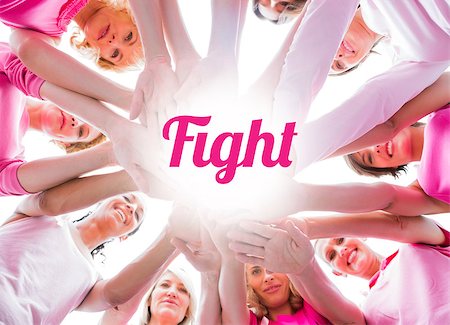 simsearch:400-07834847,k - Diverse women smiling in circle wearing pink for breast cancer on white background Stock Photo - Budget Royalty-Free & Subscription, Code: 400-07835098