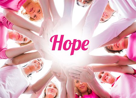 simsearch:400-07834847,k - Diverse women smiling in circle wearing pink for breast cancer on white background Stock Photo - Budget Royalty-Free & Subscription, Code: 400-07835090
