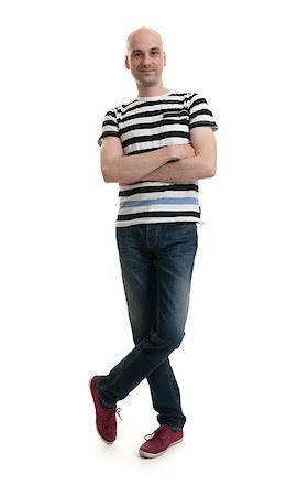 spaxiax (artist) - Full length portrait of a stylish young man standing over white background Photographie de stock - Aubaine LD & Abonnement, Code: 400-07835961