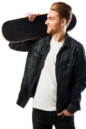 simsearch:400-04332775,k - Studio portrait of a young man posing with a skateboard Stock Photo - Budget Royalty-Free & Subscription, Code: 400-07896670