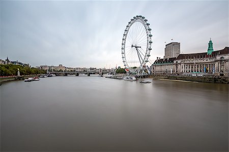 LONDON - OCTOBER 6: London Eye and Thames South Bank on October 6, 2014 in London. The largest Ferris Wheel in Europe, structure of the London Eye is 135 meters tall and 120 meters in diameter. Stock Photo - Budget Royalty-Free & Subscription, Code: 400-07896952