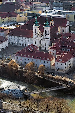 Graz, Austria - January 16, 2011: The Mariahilfer church and Island on Mur river connected by a modern steel and glass bridge, Styria, Graz, Austria Stock Photo - Budget Royalty-Free & Subscription, Code: 400-07899434