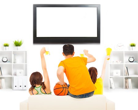 young people so excited to yelling and while watching tv Stock Photo - Budget Royalty-Free & Subscription, Code: 400-07891796