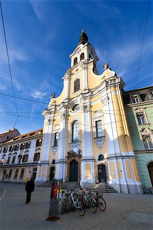 Graz, Austria - January 16, 2011: View of Brotherhood Baroque Church on Annenstrasse street in Graz, Austria Stock Photo - Budget Royalty-Free & Subscription, Code: 400-07900196