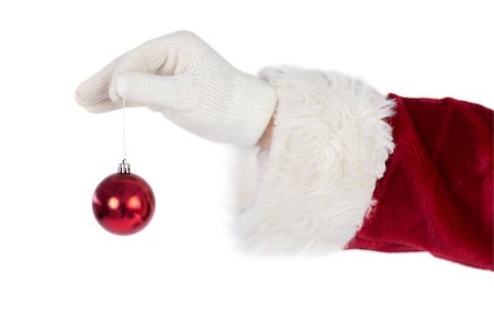 Santas hand is holding a Christmas bulb on white background Stock Photo - Budget Royalty-Free & Subscription, Code: 400-07901297