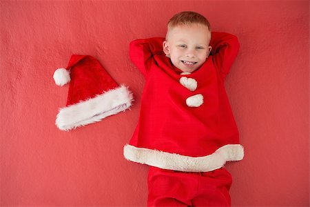 simsearch:640-03260410,k - Little boy in santa costume on red background Stock Photo - Budget Royalty-Free & Subscription, Code: 400-07902238