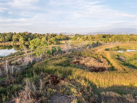 aerial view of Cotton Hollow, one of natural areas in Fort Collins, Colorado along the Poudre River converted from a gravel quarry Stock Photo - Budget Royalty-Free & Subscription, Code: 400-07914339