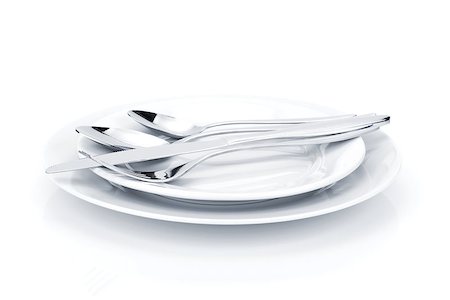 simsearch:400-06076985,k - Silverware or flatware set over plates. Isolated on white background Stock Photo - Budget Royalty-Free & Subscription, Code: 400-07915208