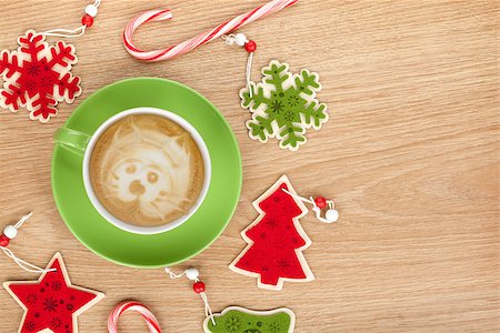 Christmas decor and coffee cup over wooden table background with copy space Stock Photo - Budget Royalty-Free & Subscription, Code: 400-07915222