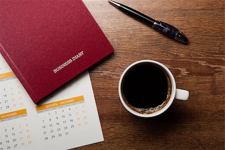 diary with large pen on the oak desk still life Stock Photo - Budget Royalty-Free & Subscription, Code: 400-07916162