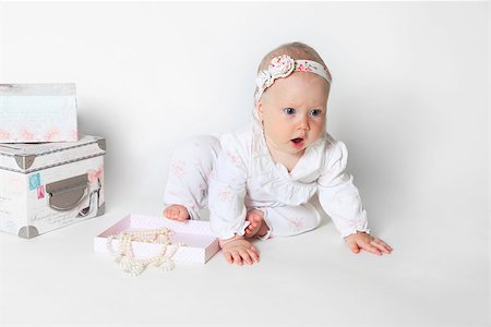 simsearch:400-05153083,k - Beautiful small kid girl in studio Stock Photo - Budget Royalty-Free & Subscription, Code: 400-07916536