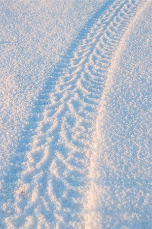 Tire tracks on the snow, winter scene Stock Photo - Budget Royalty-Free & Subscription, Code: 400-07916809