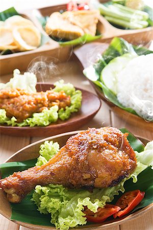 simsearch:400-07418409,k - Delicious nasi ayam penyet with sambal belacan. Fried chicken rice with overhead view. Famous traditional Indonesian food. Stock Photo - Budget Royalty-Free & Subscription, Code: 400-07917693