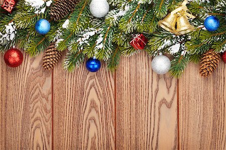 Christmas wooden background with snow fir tree, decor and copy space Stock Photo - Budget Royalty-Free & Subscription, Code: 400-07919159