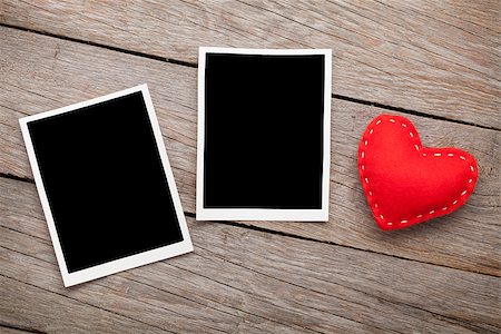 simsearch:400-07919385,k - Two photo frames and valentines day toy heart over wooden background Stock Photo - Budget Royalty-Free & Subscription, Code: 400-07919383