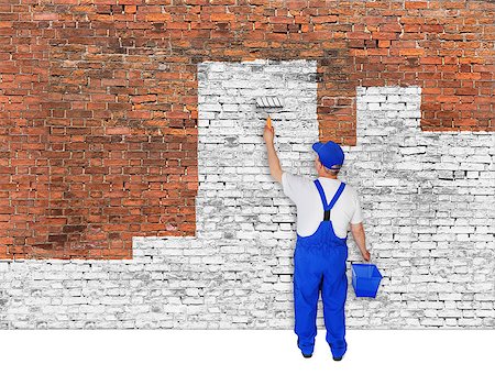 simsearch:400-08074733,k - House painter covers old brick wall with white paint Stock Photo - Budget Royalty-Free & Subscription, Code: 400-07924420