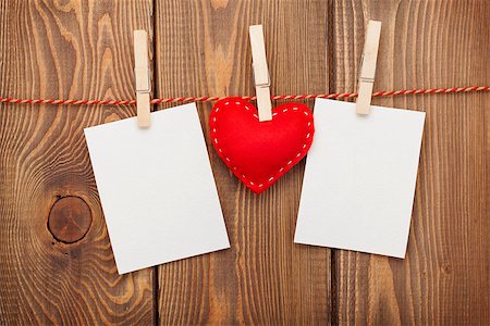 simsearch:400-07919385,k - Two photo frames and valentines day toy heart over wooden background Stock Photo - Budget Royalty-Free & Subscription, Code: 400-07925285