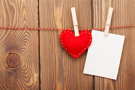 simsearch:400-07919385,k - Photo frame and valentines toy heart over wooden background Stock Photo - Budget Royalty-Free & Subscription, Code: 400-07925286