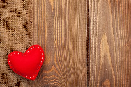 simsearch:400-07919385,k - Valentines day toy heart over wooden table background with copy space Stock Photo - Budget Royalty-Free & Subscription, Code: 400-07925282