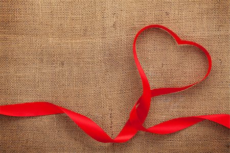 simsearch:400-07919385,k - Valentines day heart shaped ribbon over burlap with copy space Stock Photo - Budget Royalty-Free & Subscription, Code: 400-07925283