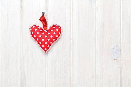 simsearch:400-07919385,k - Valentines day toy heart over wooden table background with copy space Stock Photo - Budget Royalty-Free & Subscription, Code: 400-07925317