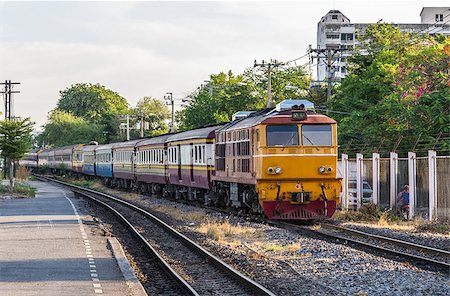 Diesel electric locomotive is arrive to the urban station. Stock Photo - Budget Royalty-Free & Subscription, Code: 400-07925356