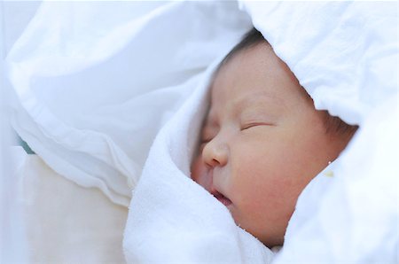 swaddle - Newborn baby on one day life covered in sheet Stock Photo - Budget Royalty-Free & Subscription, Code: 400-07920223