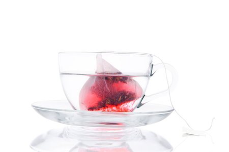 simsearch:400-04273561,k - Tea Bag In The Transparent Cup With Water Isolated On White Background Stock Photo - Budget Royalty-Free & Subscription, Code: 400-07921005
