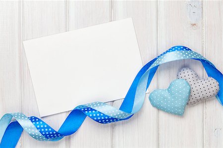 simsearch:400-07919385,k - Valentines day toy hearts and greeting card over white wooden background with copy space Stock Photo - Budget Royalty-Free & Subscription, Code: 400-07922896