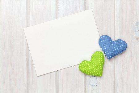 simsearch:400-07919385,k - Valentines day toy hearts and greeting card over white wooden background with copy space Stock Photo - Budget Royalty-Free & Subscription, Code: 400-07922898