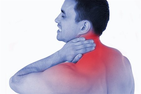 Young man suffering from neck pain Stock Photo - Budget Royalty-Free & Subscription, Code: 400-07934260