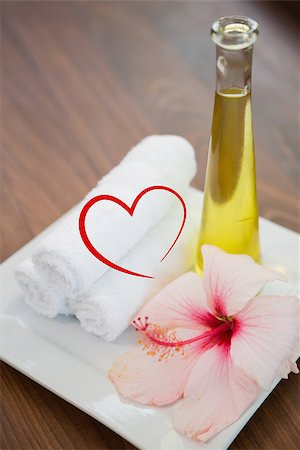 Heart against spa objects on wooden floor Stock Photo - Budget Royalty-Free & Subscription, Code: 400-07934389