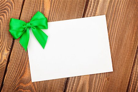 simsearch:400-07919385,k - Valentines day greeting card with green bow over wooden background Stock Photo - Budget Royalty-Free & Subscription, Code: 400-07933754
