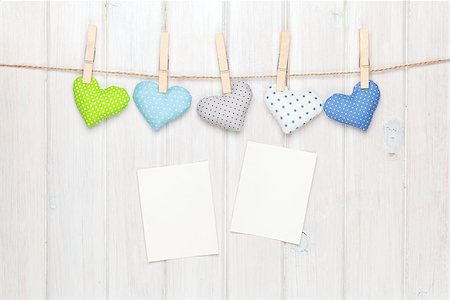 simsearch:400-07919385,k - Photo frames and valentines toy hearts over wooden background Stock Photo - Budget Royalty-Free & Subscription, Code: 400-07933790