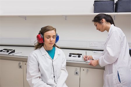 simsearch:649-07118434,k - Student doing a hearing test at the university Stock Photo - Budget Royalty-Free & Subscription, Code: 400-07940204