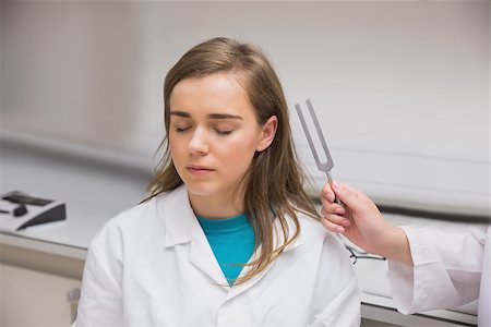 simsearch:649-07118434,k - Student doing a hearing test at the university Stock Photo - Budget Royalty-Free & Subscription, Code: 400-07940200