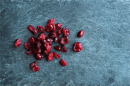 dehydrated - Closeup on dried lingonberries on stone substrate Stock Photo - Budget Royalty-Free & Subscription, Code: 400-07954094