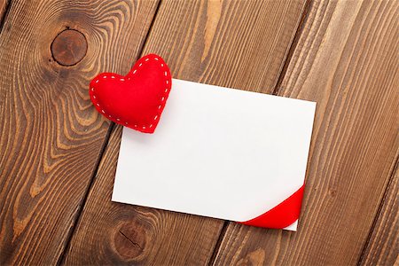 simsearch:400-07919385,k - Photo frame or greeting card and handmaded valentines day toy heart over white wooden background Stock Photo - Budget Royalty-Free & Subscription, Code: 400-07955470