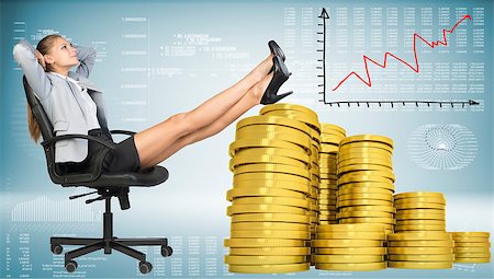 Businesswoman smiling sitting on office chair with her hands behind her head and her feet up on piles of golden coins. Graph showing growth beside. Hi-tech charts with various data as backdrop Stock Photo - Budget Royalty-Free & Subscription, Code: 400-07955504