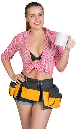 Woman in tool belt showing white mug, looking at camera, smiling. Isolated on white background Foto de stock - Super Valor sin royalties y Suscripción, Código: 400-07956376