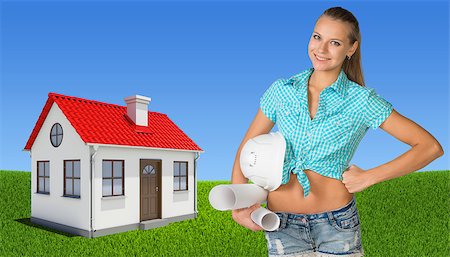 Woman holding hard hat and drawing rolls, looking at camera, smiling. Small house on green field and blue sky as backdrop Foto de stock - Super Valor sin royalties y Suscripción, Código: 400-07956381