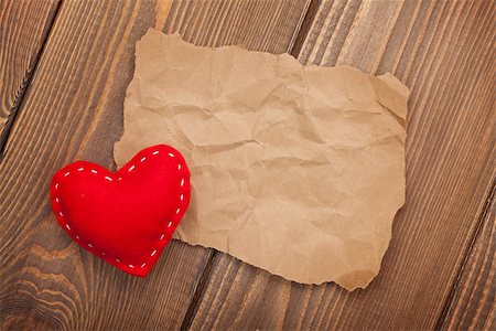 simsearch:400-07919385,k - Blank old piece of paper and vintage handmaded valentines day toy heart over wooden background Stock Photo - Budget Royalty-Free & Subscription, Code: 400-07951414
