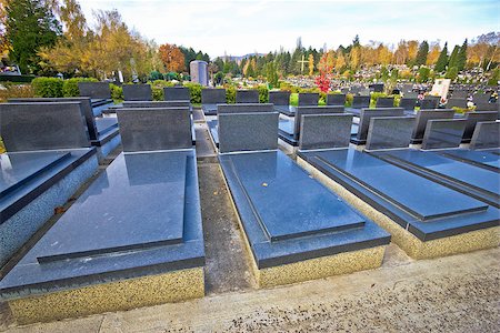 simsearch:400-04032243,k - Unmarked and unnamed cemetary marble graves Stock Photo - Budget Royalty-Free & Subscription, Code: 400-07953132