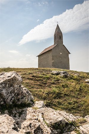 st michael - Old Roman Catholic Church of St. Michael the Archangel with Rocks in foreground on the Hill in Drazovce, Slovakia Stock Photo - Budget Royalty-Free & Subscription, Code: 400-07978313